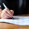 Signing closing documents in office