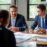 Real estate consulting session with clients at table